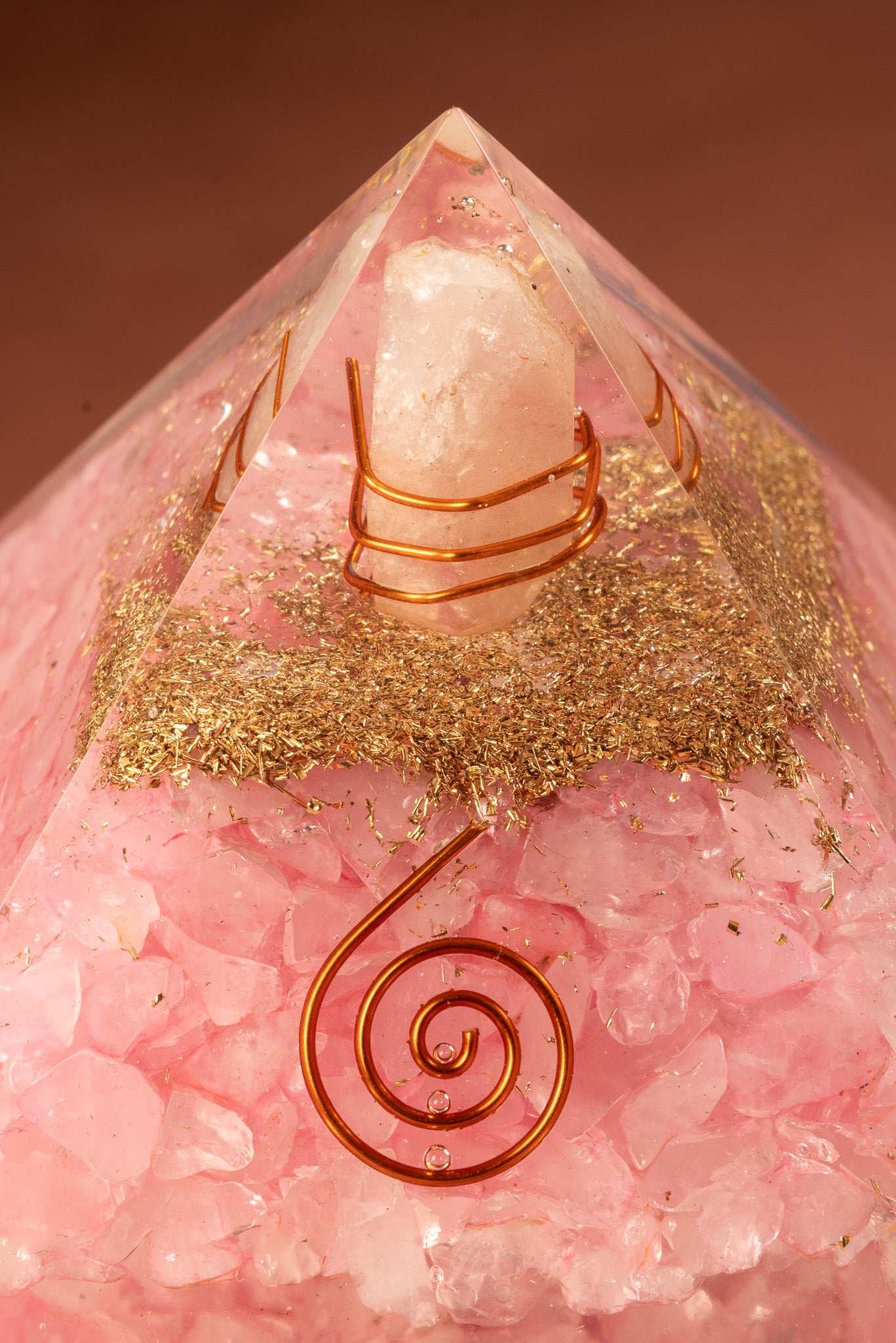 Healing orgonite pyramid with rose quartz for calm and compassion