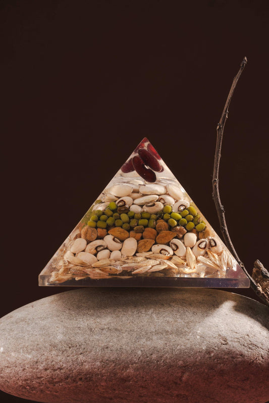 Annapurna orgonite pyramid filled with sacred grains for abundance
