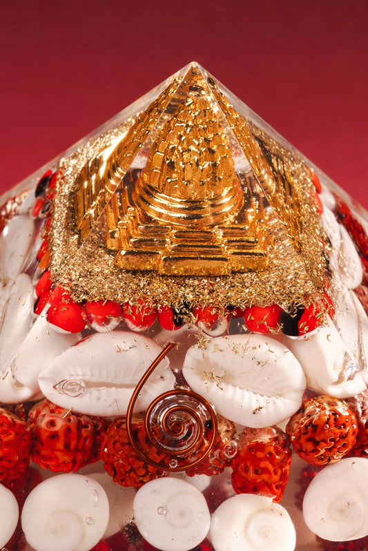 Spiritual prosperity pyramid infused with vedic elements and copper dust