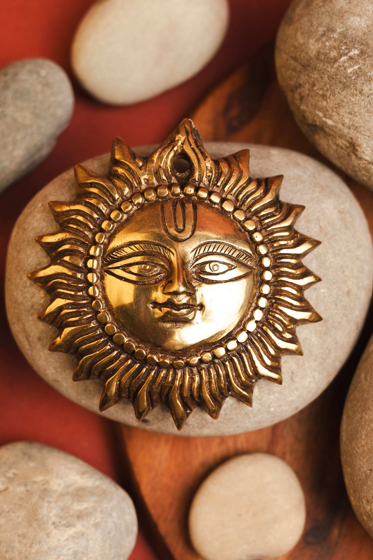 Surya symbol in brass for home energy and divine protection