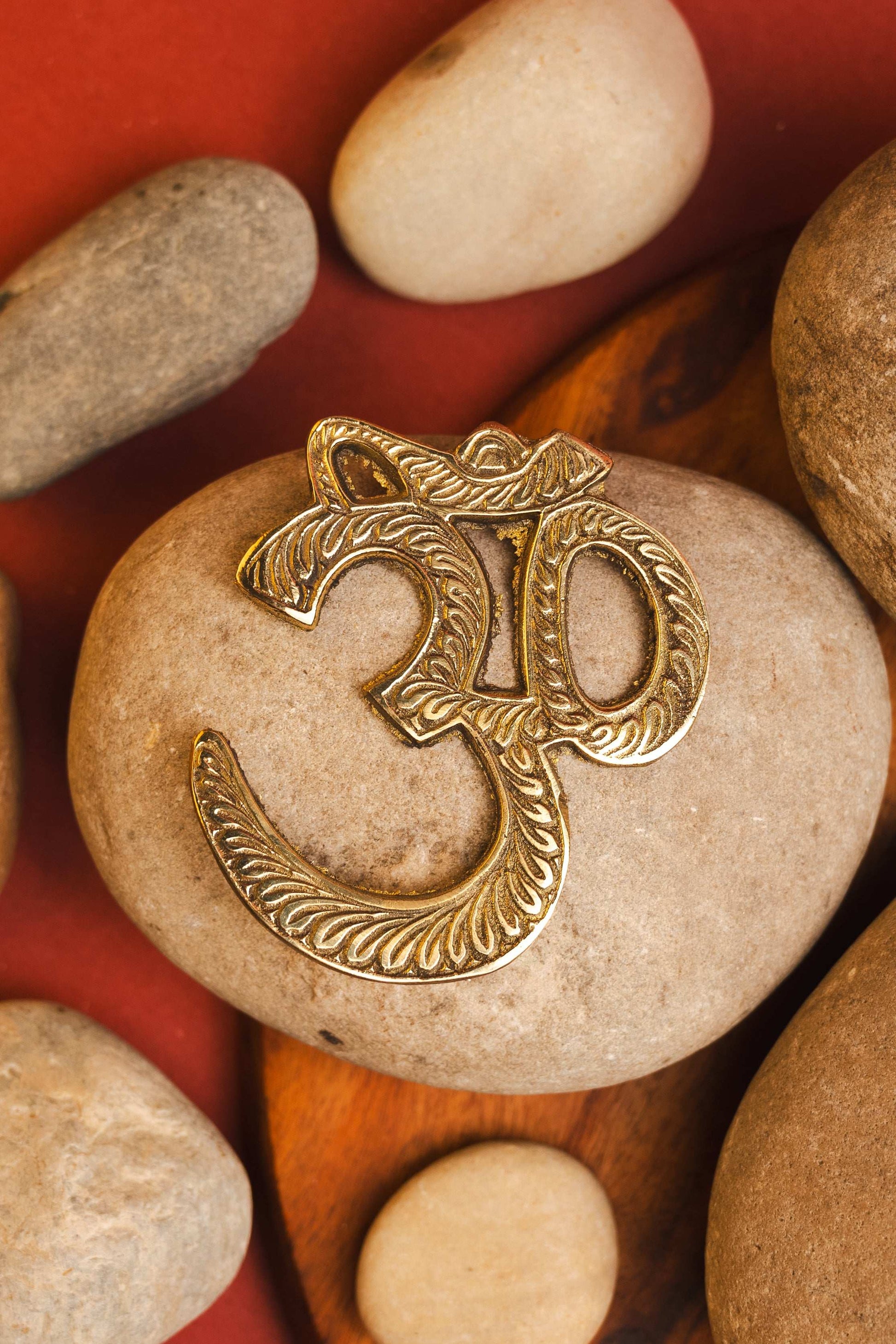 Brass Om wall hanging for spiritual energy and peace