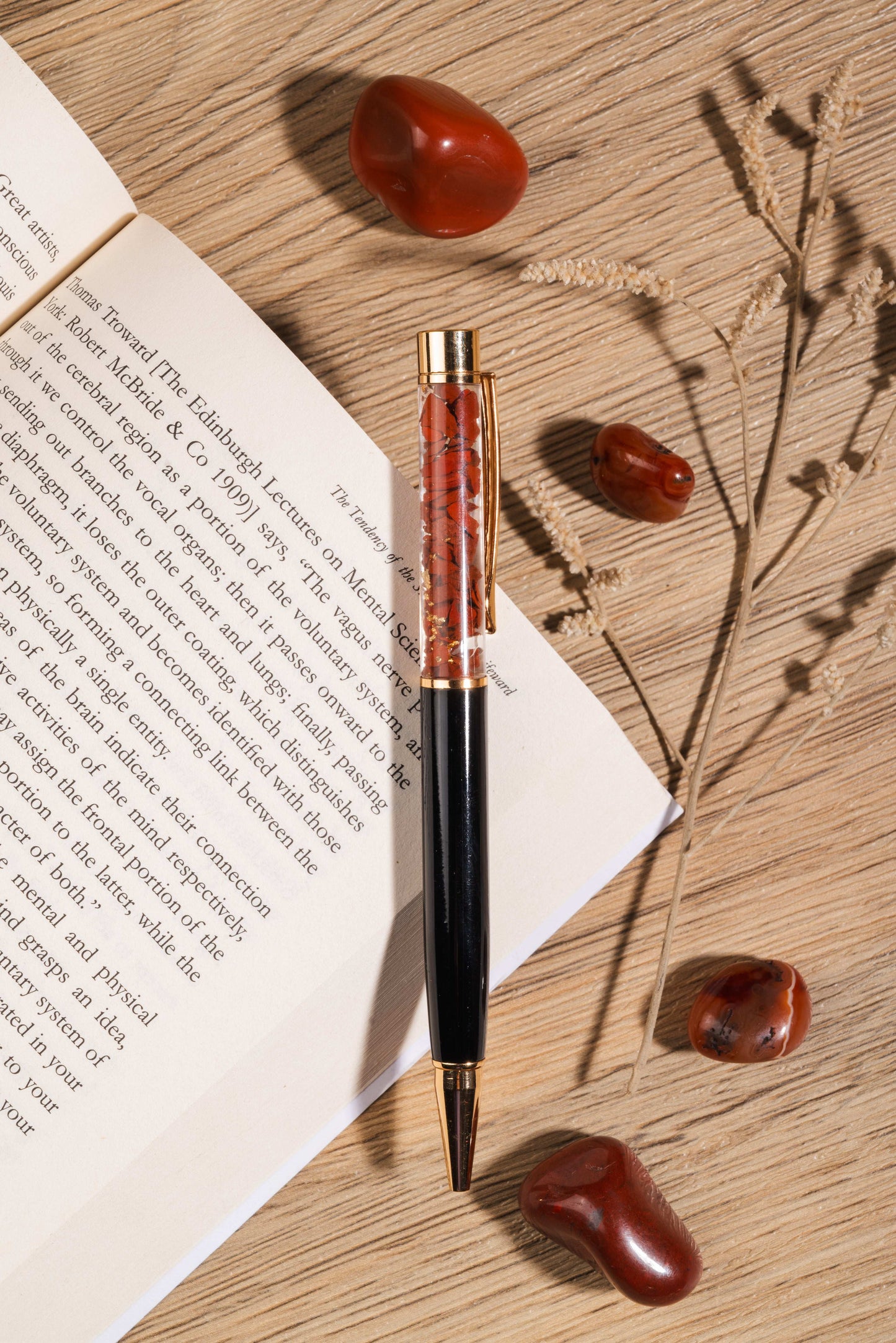 Red jasper pen for grounding, confidence, and action-oriented writing