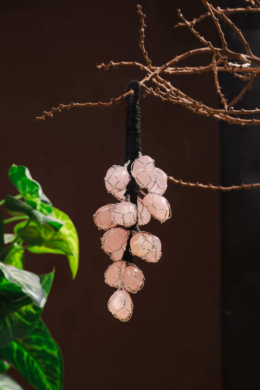 Rose quartz crystal hanging for love, harmony, and emotional healing