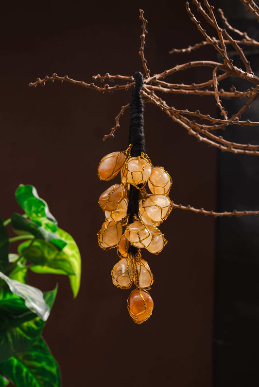 Citrine crystal hanging for abundance and prosperity activation