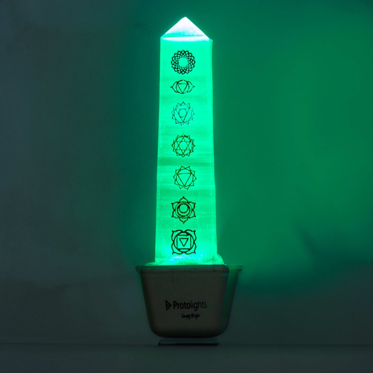 Selenite lamp with seven chakra symbols for energy alignment and cleansing