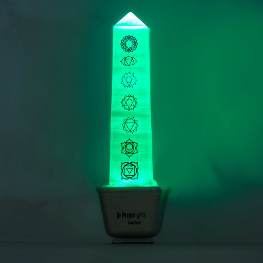 Selenite lamp with seven chakra symbols for energy alignment and cleansing